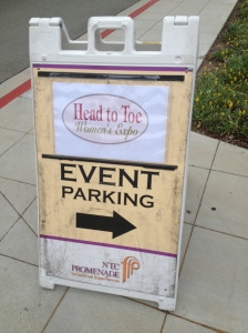 The (relatively small) sandwich board labeling the parking area.